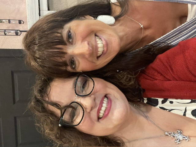 Danielle Royce smiling with a reader