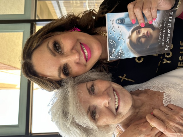 Desiree Dantas with a reader and her book Can I Touch You Jesus