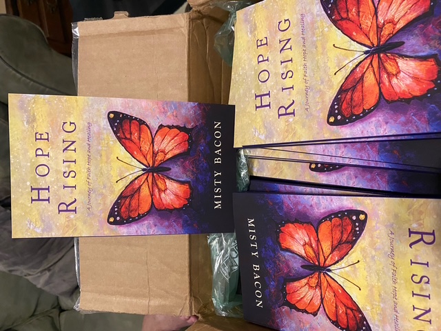 Newly printed copies of Hope Rising by Misty Bacon